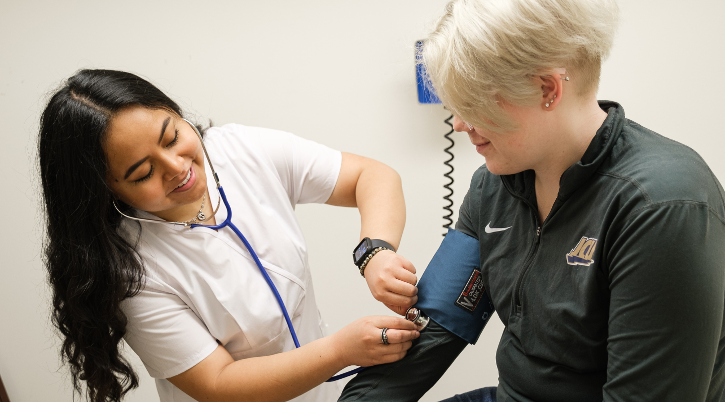 jcu health center student visiting with nurse