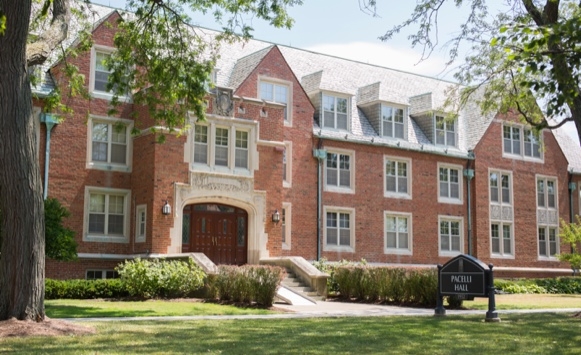 Picture of a red brick building and trees