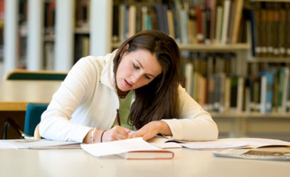 woman filling out forms